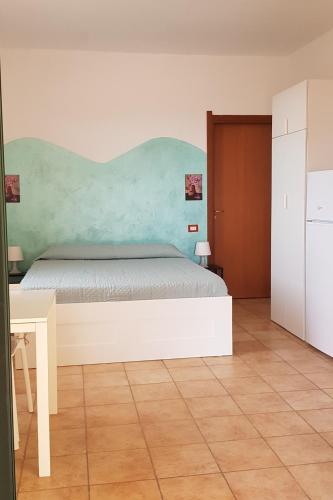 Postel nebo postele na pokoji v ubytování New Camping Coccorrocci