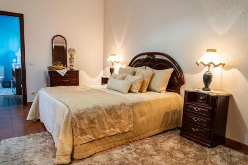 Tempat tidur dalam kamar di Quinta da Atela