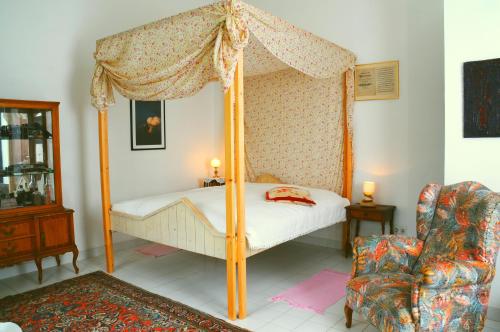 Un pat sau paturi într-o cameră la Son Baulo
