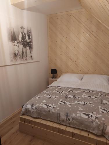 Postel nebo postele na pokoji v ubytování Apartamenty Butorowy