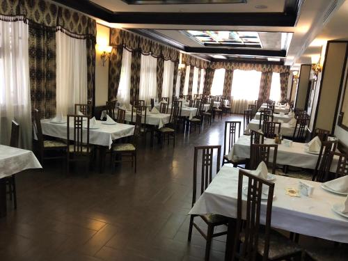 Restaurant ou autre lieu de restauration dans l'établissement Hotel Onix