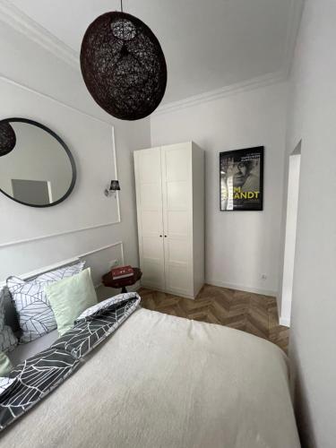 Posteľ alebo postele v izbe v ubytovaní Apartament Victor20