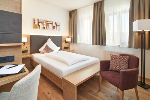 Postel nebo postele na pokoji v ubytování Landgasthof Euringer