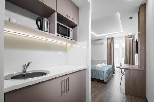 Η κουζίνα ή μικρή κουζίνα στο Hévízi Tópark Panzió III.