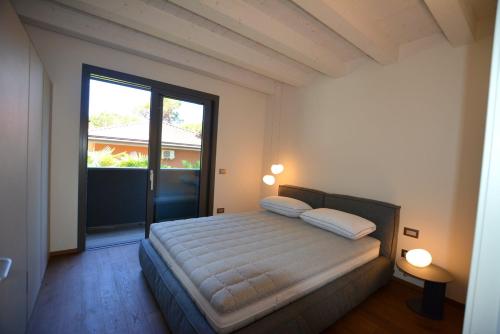 Cama o camas de una habitación en Lignano luxury villa