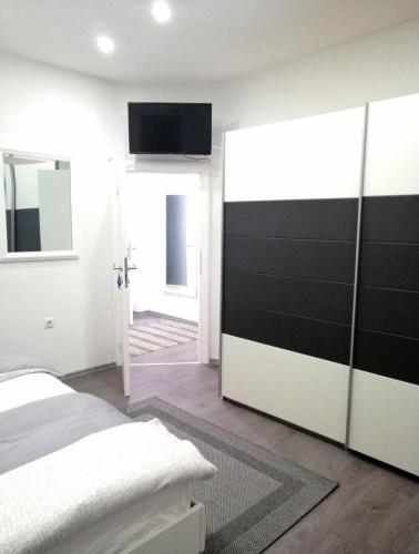 Apartman DINにあるベッド