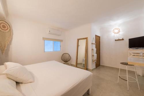 Televisyen dan/atau pusat hiburan di Hotel Caracol Puerto Morelos