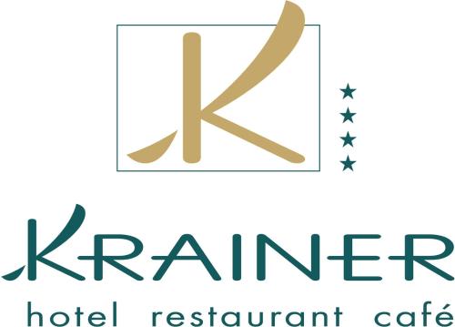 a logo for karma hotel restaurant cafeteria at Hotel-Restaurant-Café Krainer in Langenwang