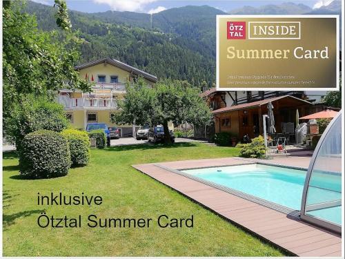 a sign for a summer yard with a swimming pool at Haus Monika in Oetz