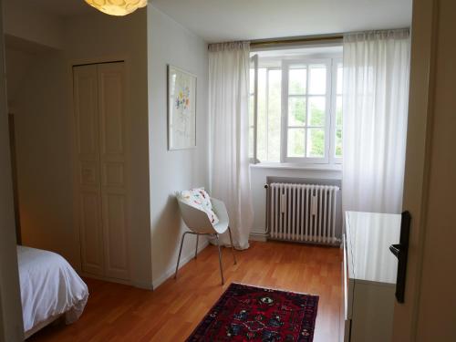 A bed or beds in a room at B&B côté jardin