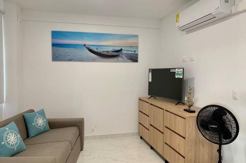 Apartamentos CC San Andres cerca a la playaにあるテレビまたはエンターテインメントセンター