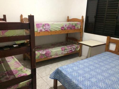 Postel nebo postele na pokoji v ubytování Ótima casa com piscina em Praia Grande