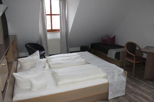 Hotel & Landgasthof Forsthofにあるベッド