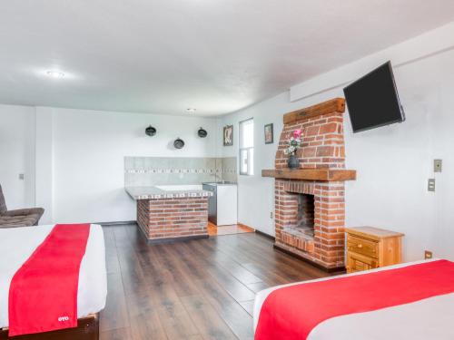 Ein Bett oder Betten in einem Zimmer der Unterkunft Hotel Vista Markés