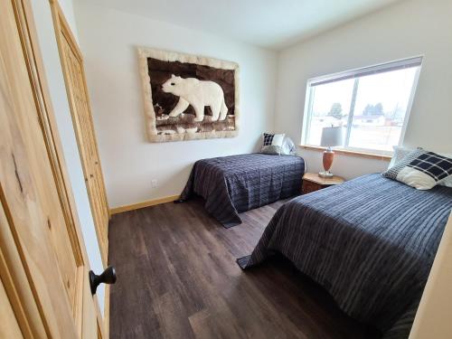 Llit o llits en una habitació de Beaverhead House Rental