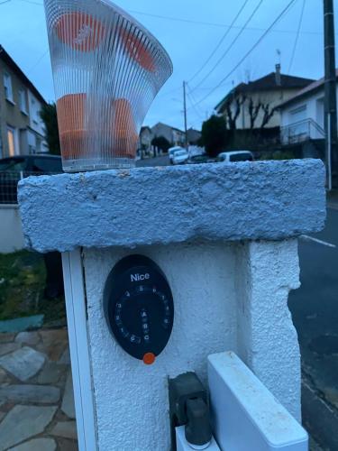 a bird house with a speedometer on top of it at LOGEMENT PERIGUEUX in Champcevinel
