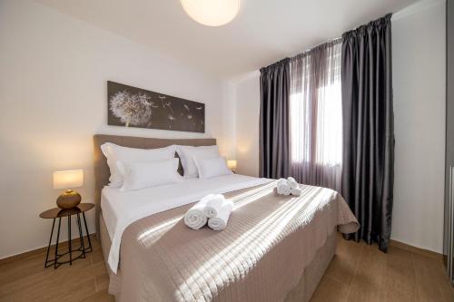 Кровать или кровати в номере Apartments Lace