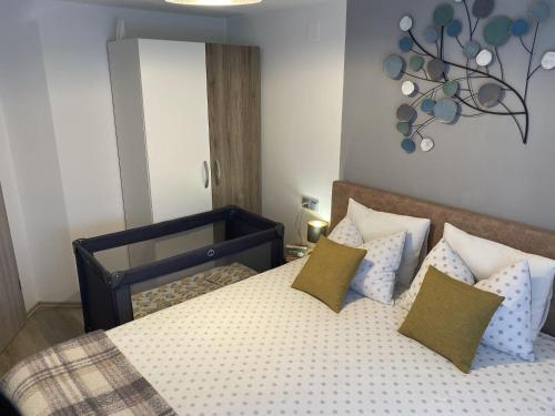 Postel nebo postele na pokoji v ubytování AQUA - TUHELJ - LAND