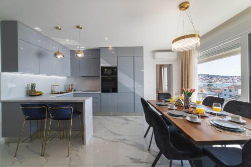 Kuchyň nebo kuchyňský kout v ubytování Apartman Blue Wave