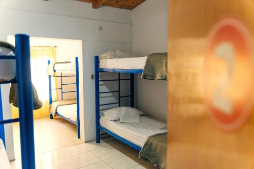 Postel nebo postele na pokoji v ubytování SIGRUM Hostel