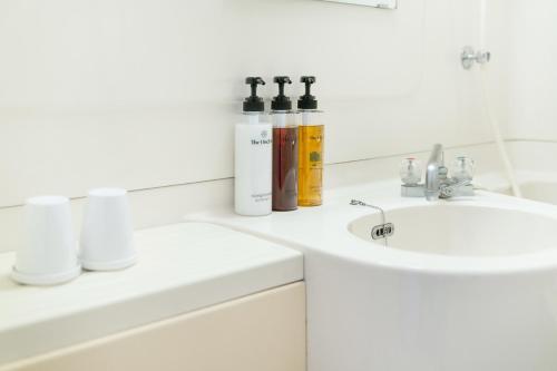 Ein Badezimmer in der Unterkunft The OneFive Okayama