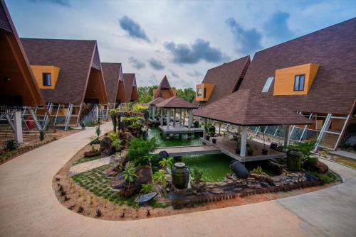 an aerial view of a house with a garden at One of A Kind Resort @Trikora Beach - Bintan in Telukdalam