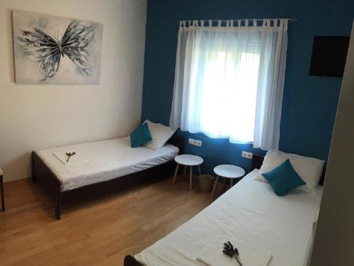 Ένα ή περισσότερα κρεβάτια σε δωμάτιο στο Apartment Nikola M - 2 bedrooms