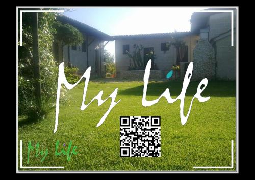 a sign that says my life in front of a yard at MyLife B&B Country House in Castellaneta Marina 