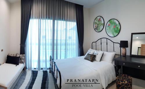 Imagen de la galería de Pranatarn Pool Villa Beach Night Cottage, en Pran Buri