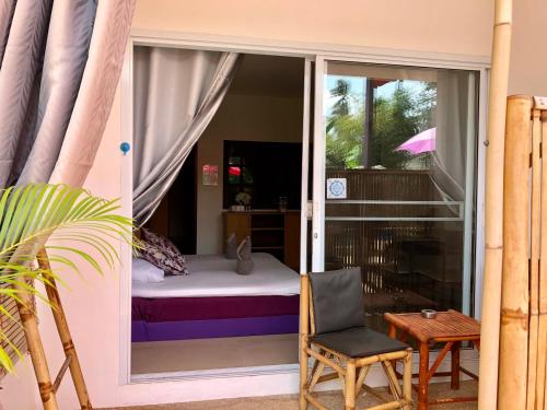 Postel nebo postele na pokoji v ubytování Samui Zenity