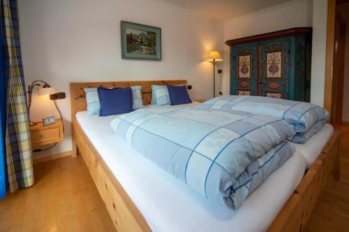 En eller flere senge i et værelse på Haus Rosenbächle