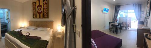 Postel nebo postele na pokoji v ubytování Samui Zenity