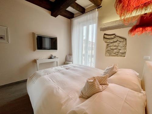 Postel nebo postele na pokoji v ubytování B&B Verona Centro