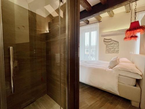 Ένα ή περισσότερα κρεβάτια σε δωμάτιο στο B&B Verona Centro