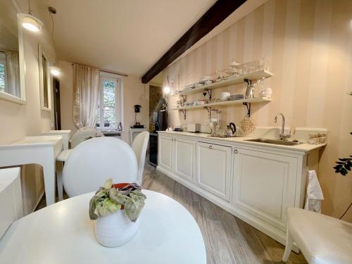 Kuchyň nebo kuchyňský kout v ubytování B&B Verona Centro