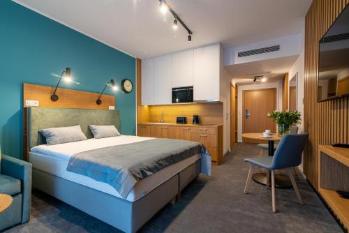 Llit o llits en una habitació de Seaside Apartaments Deluxe 105