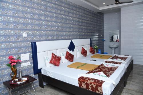 Postel nebo postele na pokoji v ubytování Rightchoicehotels