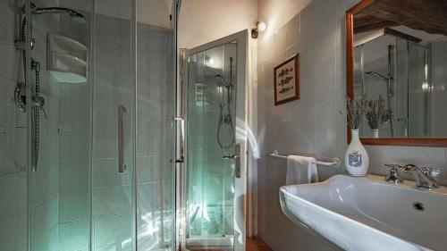 a bathroom with a shower and a sink at Salve Regina in Impruneta