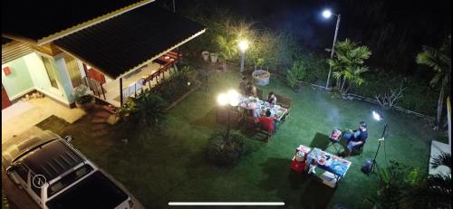 an aerial view of a yard at night at Panutsaya Homestay in Wang Nam Khieo