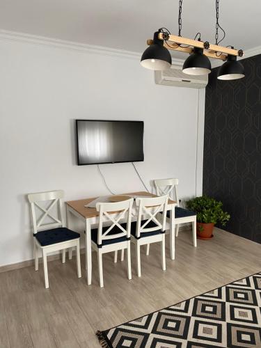 Телевізор і / або розважальний центр в Aria apartman