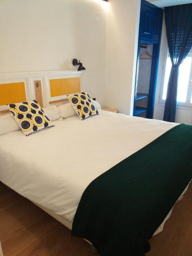 Ένα ή περισσότερα κρεβάτια σε δωμάτιο στο Hotel Alda Jolio Jaca