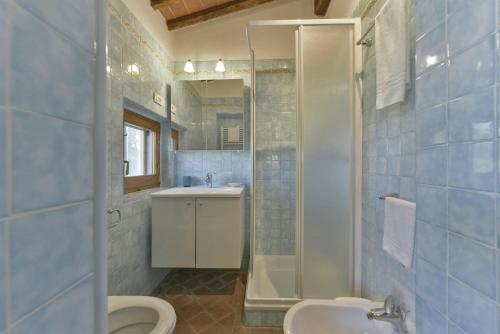 Ein Badezimmer in der Unterkunft Calafralina