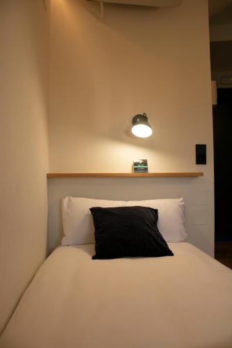 Ένα ή περισσότερα κρεβάτια σε δωμάτιο στο Hotel Alda Jolio Jaca