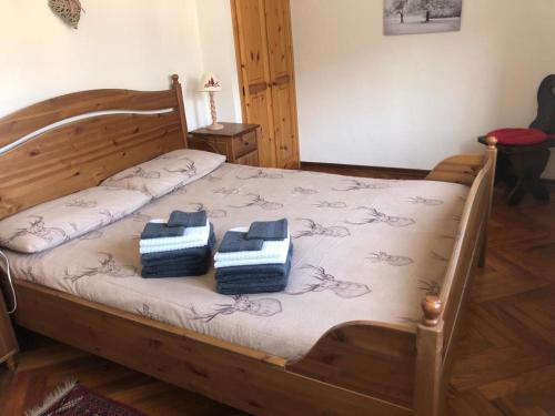 Ένα ή περισσότερα κρεβάτια σε δωμάτιο στο Walking distance from chairlift and center-60 sq m Wi-Fi Casa Lucia