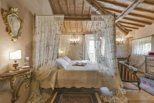 Giường trong phòng chung tại Vecchio Frantoio