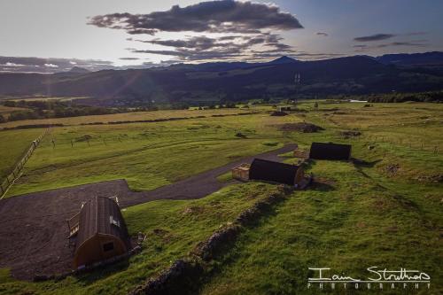 an aerial view of a field with two tents at Farragon Luxury Glamping Pod with Hot Tub & Pet Friendly at Pitilie Pods in Aberfeldy