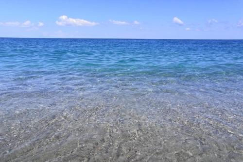 a large body of water with the ocean at Sea Palace Hotel in Marina di Fuscaldo