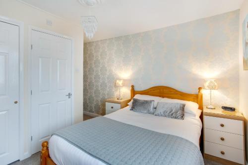 Katil atau katil-katil dalam bilik di Trelawney Hotel - Guest House