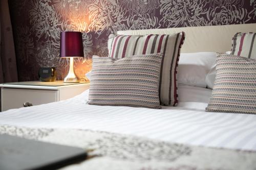 Katil atau katil-katil dalam bilik di Trelawney Hotel - Guest House