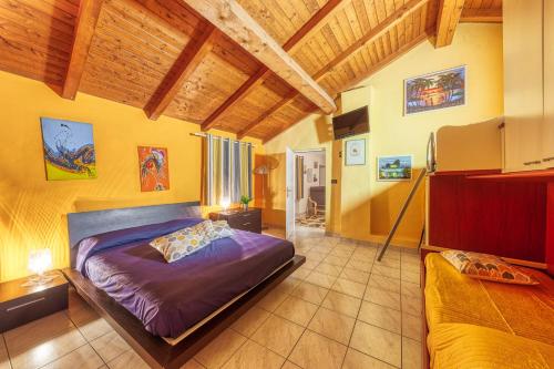 Postel nebo postele na pokoji v ubytování CasaViva - Casa Vacanze ad Albenga via Roma